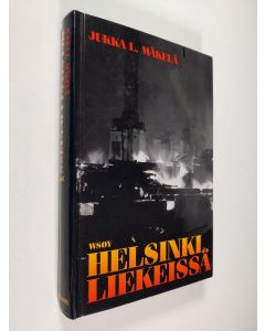 Kirjailijan Jukka L. Mäkelä käytetty kirja Helsinki liekeissä (tekijän omiste)