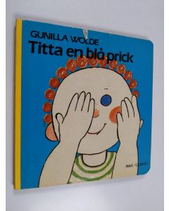 Kirjailijan Gunilla Wolde käytetty kirja Titta en blå prick