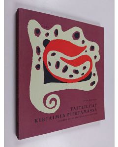 Kirjailijan Tuija Kuusela käytetty kirja Taiteilijat kirjaimia piirtämässä : Suomen kultakauden kirjataidetta