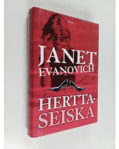 Kirjailijan Janet Evanovich käytetty kirja Herttaseiska