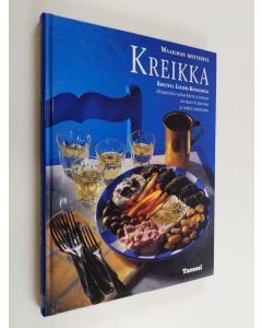 Kirjailijan Kristina Likidis-Königsfeld käytetty kirja Maailman keittiöitä Kreikka : alkuperäisiä ruokaohjeita ja katsaus Kreikan eri alueisiin ja niiden asukkaisiin