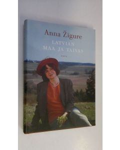 Kirjailijan Anna Zigure käytetty kirja Latvian maa ja taivas : kertomuksia Latvian historiasta ja nykypäivästä Anna Zigure