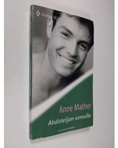 Kirjailijan Anne Mather käytetty kirja Ahdistelijan armoilla