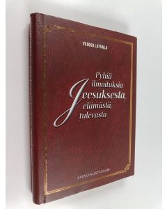 Kirjailijan Veikko Latvala käytetty kirja Pyhiä ilmoituksia Jeesuksesta, elämästä, tulevasta