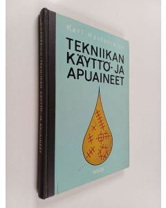Kirjailijan Pauli Heikkilä & Karl Heidenreich käytetty kirja Tekniikan käyttö- ja apuaineet