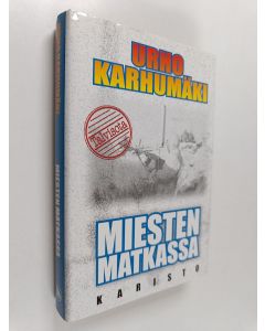 Kirjailijan Urho Karhumäki käytetty kirja Miesten matkassa