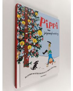 Kirjailijan Astrid Lindgren käytetty kirja Pippi Långstrump har julgransplundring : bilderbok
