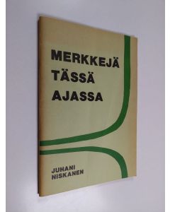 Kirjailijan Juhani Niskanen käytetty teos Merkkejä tässä ajassa : havaintoja ja tulkintaa