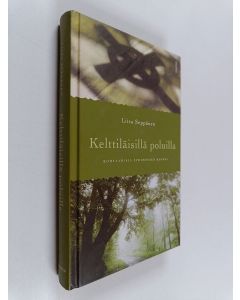 Kirjailijan Liisa Seppänen käytetty kirja Kelttiläisillä poluilla : kohtaamisia pyhimysten kanssa