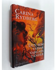 Kirjailijan Carina Rydberg käytetty kirja Den som vässar vargars tänder roman