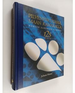 Kirjailijan Juhani Niemi käytetty kirja Pilvenpiirtäjässä, maan kamaralla : Hämeen sanomien vaiheita 125 vuotta