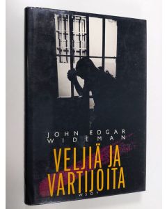 Kirjailijan John Edgar Wideman käytetty kirja Veljiä ja vartijoita