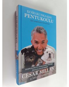 Kirjailijan Cesar Millan käytetty kirja Koirakuiskaajan pentukoulu