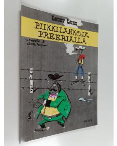 Kirjailijan Morris käytetty kirja Piikkilankoja preerialla