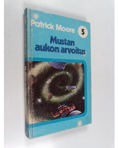 Kirjailijan Patrick Moore käytetty kirja Mustan aukon arvoitus