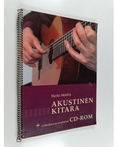 Kirjailijan Heiki Mätlik käytetty teos Akustinen kitara