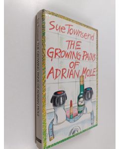 Kirjailijan Sue Townsend käytetty kirja The growing pains of Adrian Mole