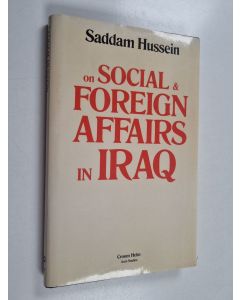Kirjailijan Saddam Hussein käytetty kirja Social and foreign affairs in Iraq