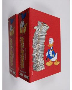 Kirjailijan Walt Disney käytetty teos Aku Ankka vuosikerta 2000 (nrot 1-52 kahdessa kansiossa)