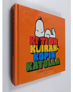 Kirjailijan Charles M. Schulz käytetty kirja Koti on koirankopin katolla