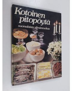Tekijän Helena Ahti...  käytetty kirja Kotoinen pitopöytä : suomalaista silmänruokaa