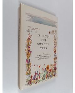 Kirjailijan Lorna Downman käytetty kirja Round the swedish year : daily life and festivals through four seasons