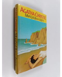 Kirjailijan Agatha Christie käytetty kirja Mord på ljusa dagen