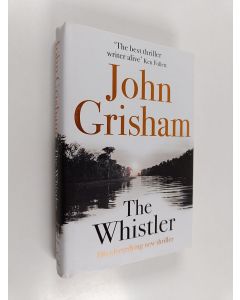 Kirjailijan John Grisham käytetty kirja The whistler