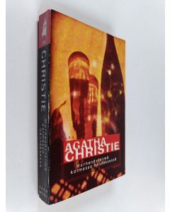 Kirjailijan Agatha Christie käytetty kirja Murhenäytelmä kolmessa näytöksessä
