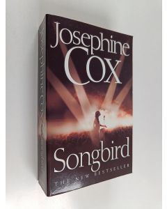 Kirjailijan Josephine Cox käytetty kirja Songbird