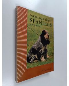 Kirjailijan A. P. Norlund käytetty kirja Cocker og springer spaniels