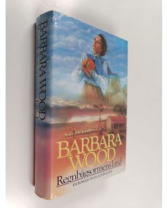 Kirjailijan Barbara Wood käytetty kirja Regnbågsormens land : en roman från Australien