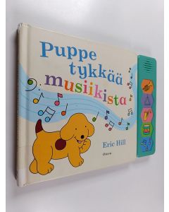 Kirjailijan Eric Hill käytetty kirja Puppe tykkää musiikista