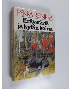 Kirjailijan Pekka Reinikka käytetty kirja Eräystäviä ja kylän koiria