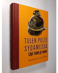 Kirjailijan Juhani Kostet käytetty kirja Tulen polte sydämessä : läpi tulen ja savun : Suomen palopäällystöliitto 75 vuotta