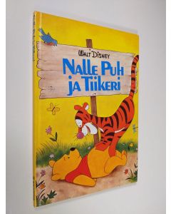 Kirjailijan Walt Disney käytetty kirja Nalle Puh ja Tiikeri : Disneyn satulukemisto