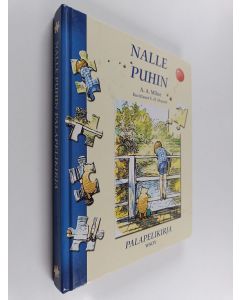 Kirjailijan A. A. Milne käytetty kirja Nalle Puhin palapelikirja