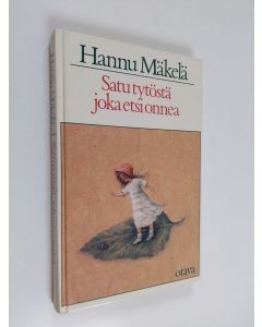 Kirjailijan Hannu Mäkelä käytetty kirja Satu tytöstä, joka etsi onnea