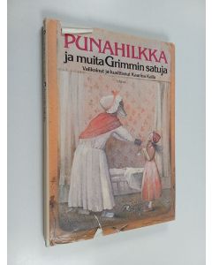 Kirjailijan Jacob Grimm käytetty kirja Punahilkka ja muita Grimmin satuja