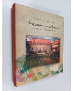 Kirjailijan Tiina Koskimies & Maarit Knuuttila käytetty kirja Pappilan puutarhassa : kasveja ja kulttuurihistoriaa