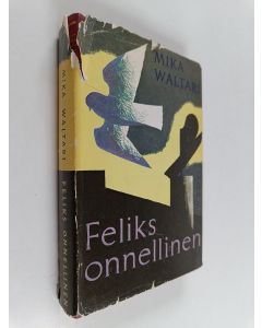 Kirjailijan Mika Waltari käytetty kirja Feliks onnellinen