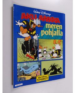 Kirjailijan Walt Disney käytetty kirja Aku Ankka meren pohjalla