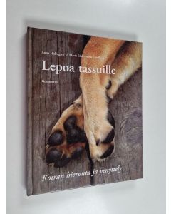 Kirjailijan Anna Holmgren käytetty kirja Lepoa tassuille! : koiran hieronta ja venyttely