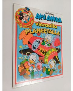 Kirjailijan Walt Disney käytetty kirja Aku Ankka vieraalla planeetalla