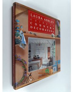 Kirjailijan Laura Ashley käytetty kirja Laura Ashley : guide to country decorating