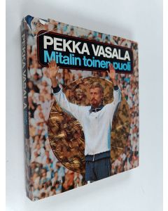 Kirjailijan Risto Taimi käytetty kirja Mitalin toinen puoli