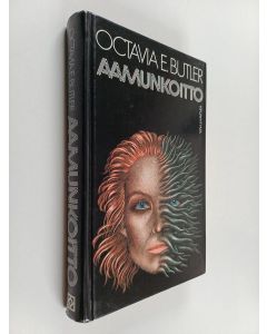Kirjailijan Octavia E. Butler käytetty kirja Aamunkoitto