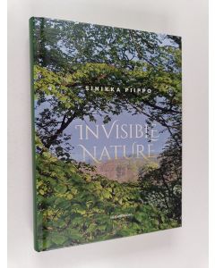 Kirjailijan Sinikka Piippo käytetty kirja Invisible Nature
