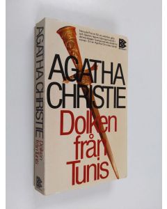 Kirjailijan Agatha Christie käytetty kirja Dolken från Tunis