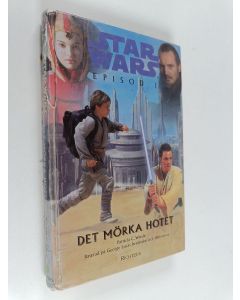 Kirjailijan Patricia C. Wrede käytetty kirja Det mörka hotet